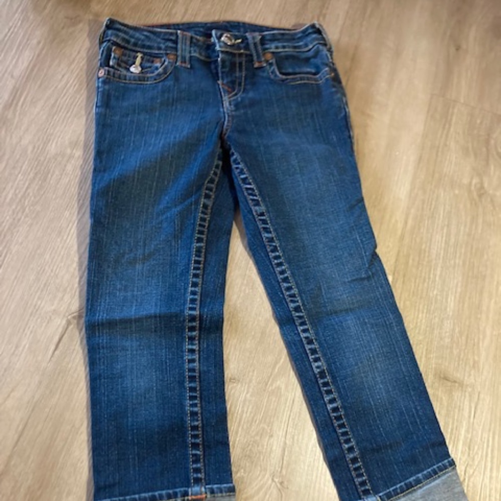 Girls, True Religion jeans.